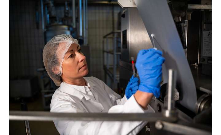 Woman swabbing in lab