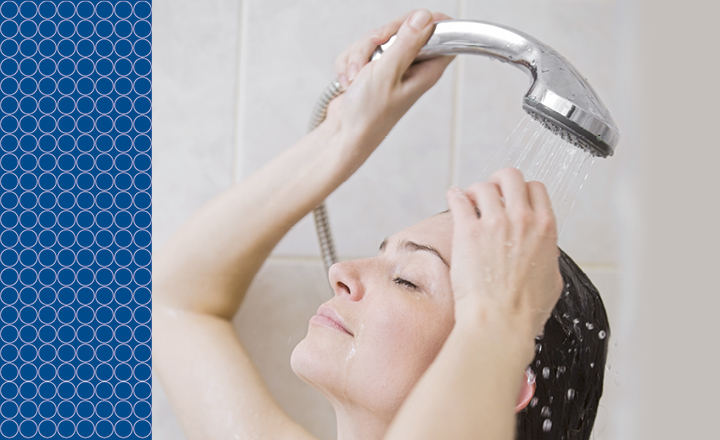 Woman showering head