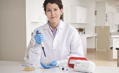 Microbiologist using Test-Ready Control Strains
