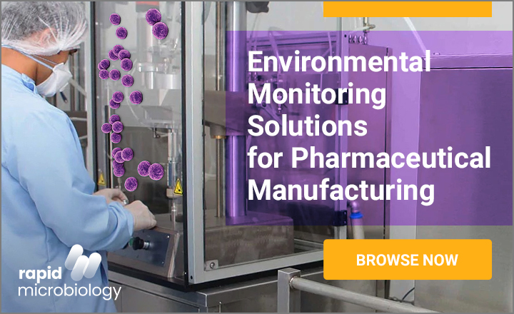 Pharmaceutical microbiologist working in isolator cabinet with cartoon microbial contaminants